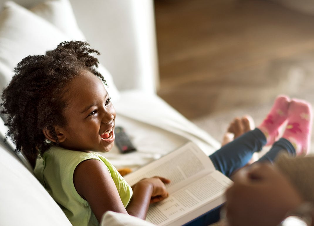 cheerful-girl-reading cheerful-girl-reading