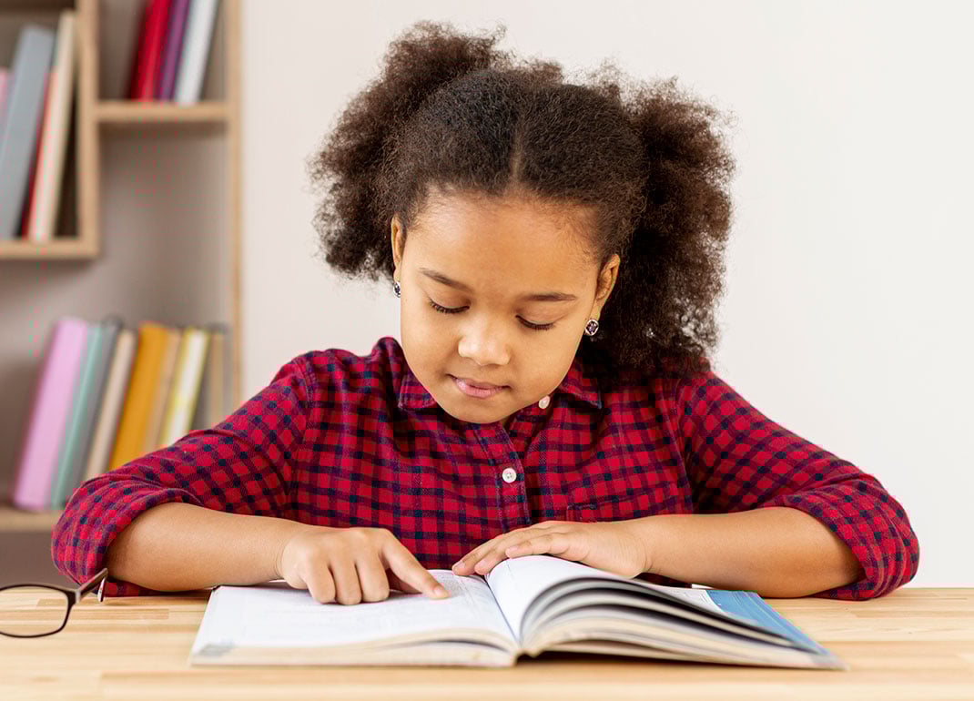 child-reading-alone child-reading-alone