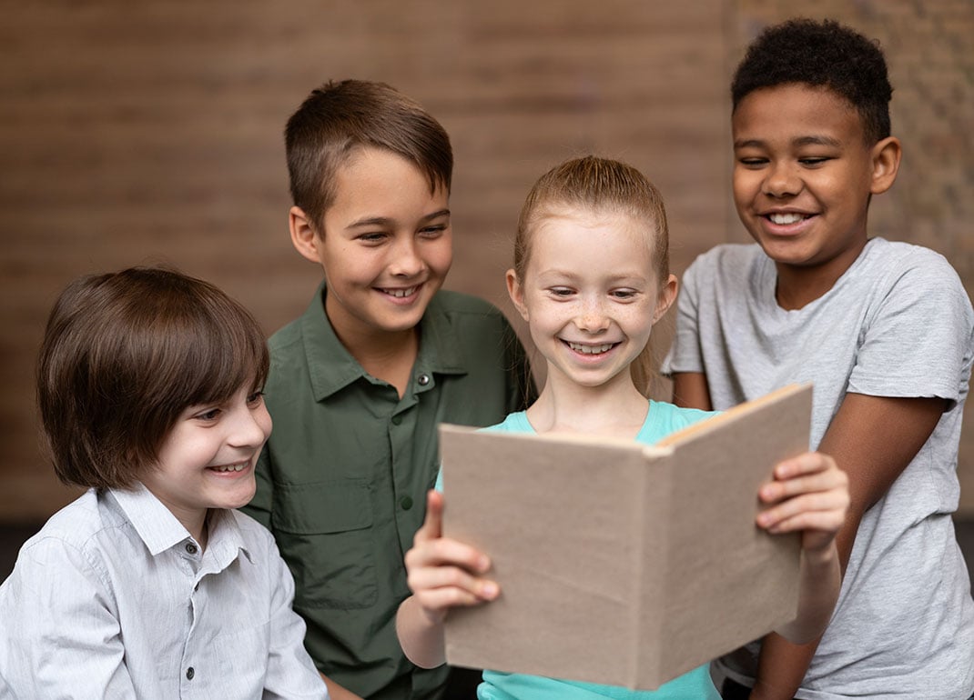 group-of-kids-reading-book group-of-kids-reading-book