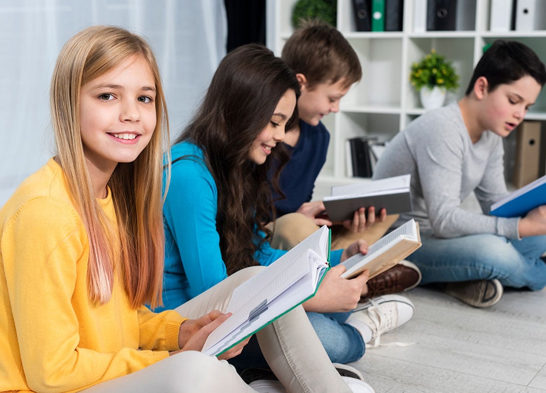 group-of-students-reading group-of-students-reading