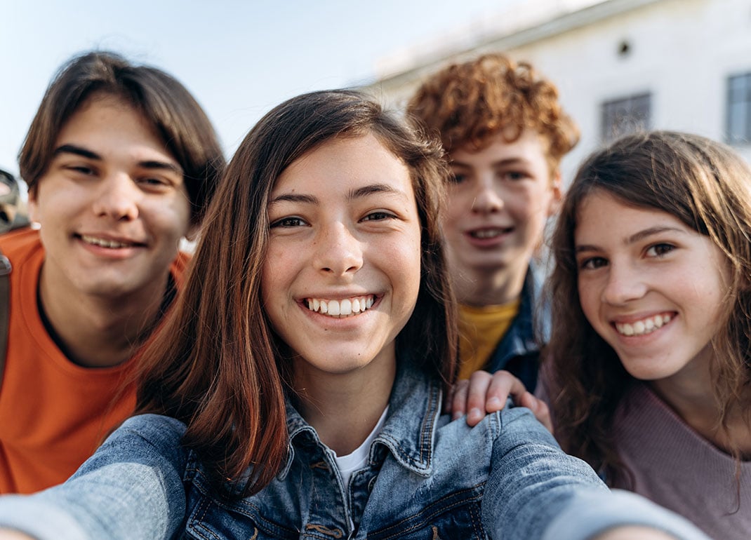 students-taking-a-selfie students-taking-a-selfie