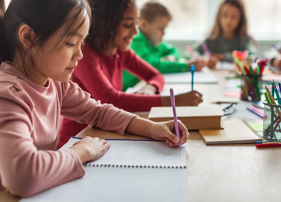 students-writing-small-group students-writing-small-group